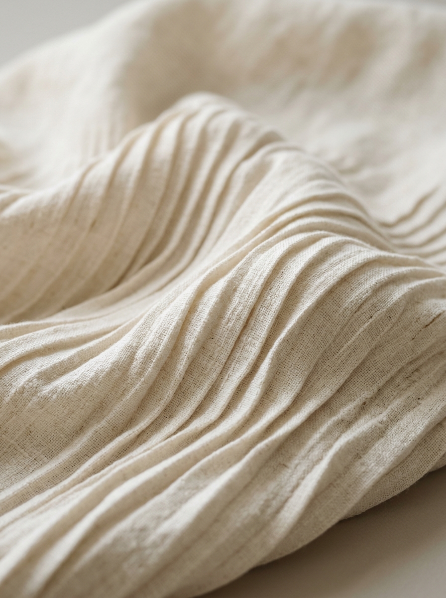 Pleated cream linen fabric folds